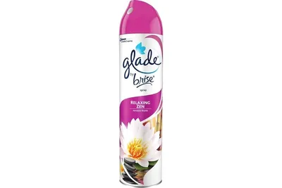 A single can of Glade air freshener spray with a pink cap and a label featuring a lotus flower and bamboo.