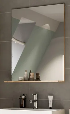 A bathroom mirror with a shelf above a sink, showing toiletries.
