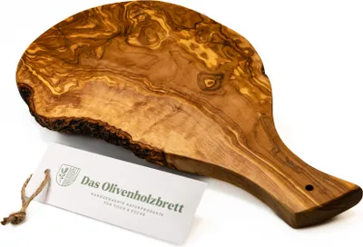 A wooden cutting board with a handle and a tag attached to it, placed on a white background.