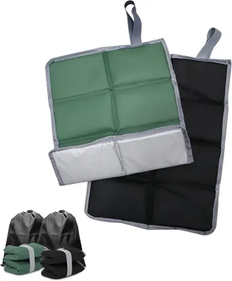 Two foldable outdoor seat cushions, one green and one black, are displayed. Below them are two folded seat cushions in bags, one green and one black.