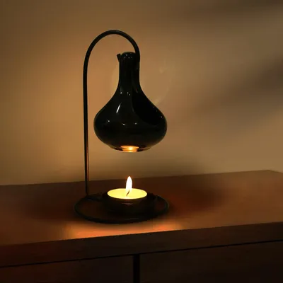 Productafbeelding van Aroma lamp van keramiek - Aroma diffuser met theelichthouder en lepel - Zwart