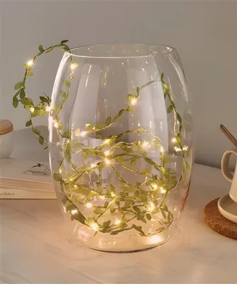 Produktbild von Lichterkette "Blätter" 4m lang, 40 warmweiße LEDs, Leuchtdeko, Leuchtdraht mit grünen Blättern