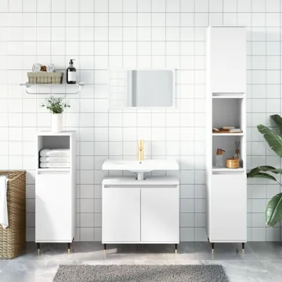 A clean, modern bathroom with white tiled walls and a grey rug on the floor.