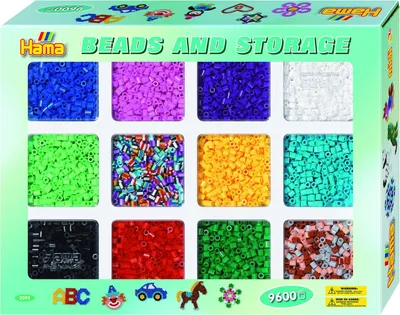 A box of Hama beads with multiple compartments filled with different colored beads.
