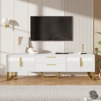 A white TV stand with gold accents is shown in a living room setting.