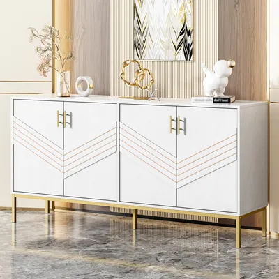 A white and gold sideboard with decorative elements on top, set against a neutral background.