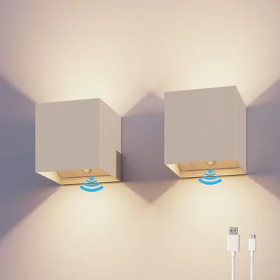 Produktbild von Calex Volterra Wandleuchte, für Außen & Innen, warmweißes Up & Down Licht, Akku aufladbar mit USB-C, kabellos, Bewegungsmelder, wasserdicht, Sand, 2er Pack