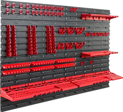 A wall-mounted tool organizer system with various red holders and shelves attached to a black pegboard.