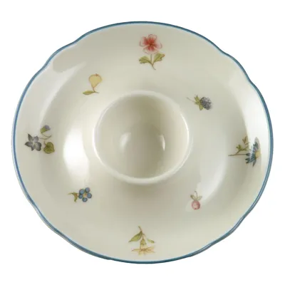 Produktbild von Eierbecher - Elfenbeinfarben - Porzellan - mit blauem Rand - mit Streublumenmotiv - Ø 13 cm