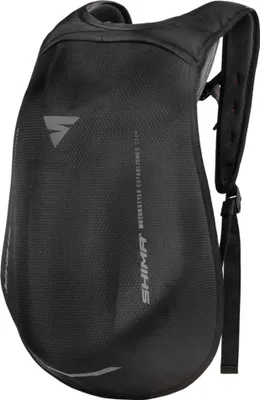 A black motorcycle backpack is shown against a white background.