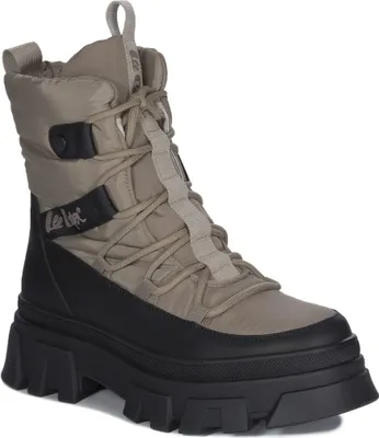 A single tan and black boot is shown against a white background.