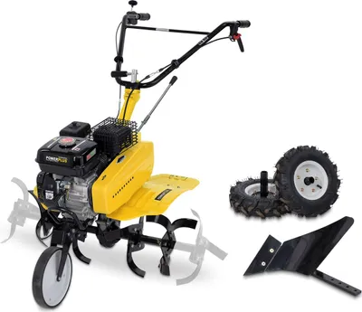 A yellow and black rototiller with accessories on a white background.