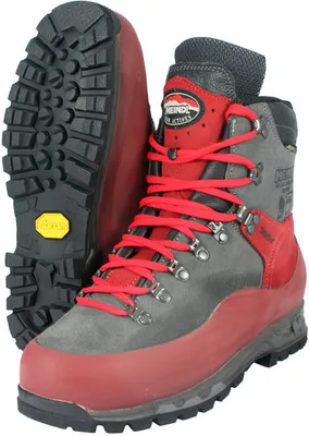A pair of hiking boots, one shown from the side and the other from the sole.