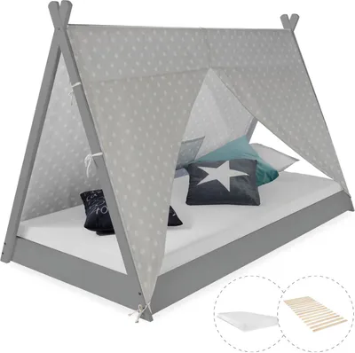 A children's bed with a tipi-style canopy and bedding.
