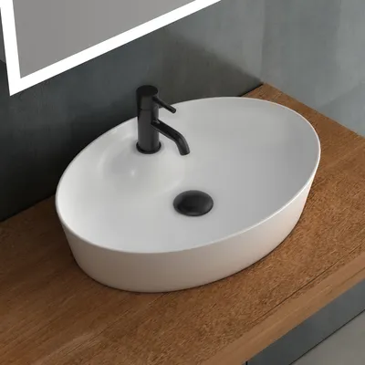 Produktbild von Alpenberger Ovale Waschschale 55 cm | Aufsatzwaschbecken Modern aus Keramik mit Nano Lotuseffekt | Aufsetzbare Schale mit Hahnloch | Waschbecken Schüssel | Badkeramik mit Beschichtung