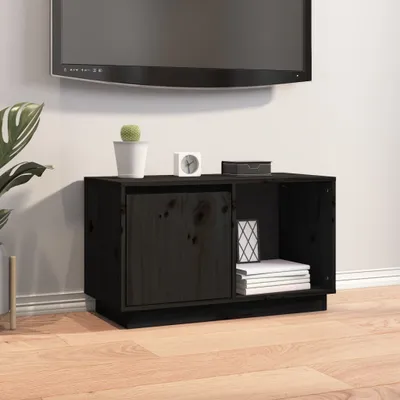 A black wooden TV stand with a TV mounted above it.