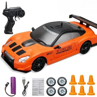 Produktbild von 2,4-GHz RC-Drift-Auto 4WD im Maßsta, ferngesteuertes Rennauto mit Beleuchtung, 15 km/h und 3,7-V-Akku - Orange