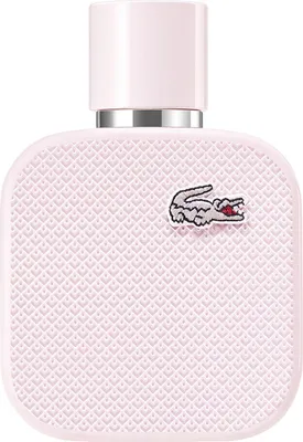 A close-up studio shot of a pink Lacoste perfume bottle.