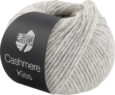 A ball of light gray yarn with a black label.