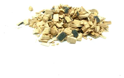 A pile of wood chips on a white background.