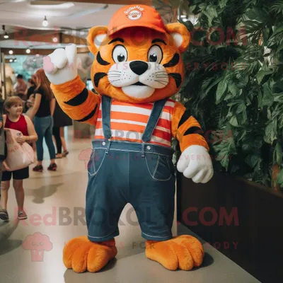 Obrázek produktu pro Postava REDBROKOLY maskota oranžového tygra v kostýmu máma džíny a čepice