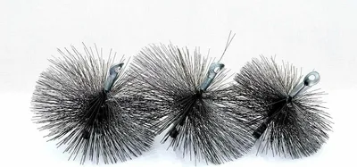 Three chimney brushes of varying sizes are arranged in a row against a white background.