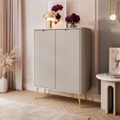 Produktbild von Zweitürige Kommode ZAIRA K103 Kaschmir schräge gold Chrom Beine