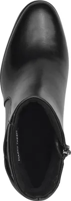 A top-down view of a black leather boot.