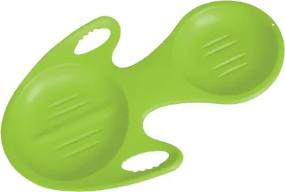 A bright green plastic sled on a white background.