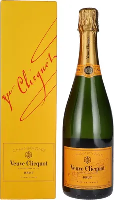 A bottle of Veuve Clicquot Brut champagne and its yellow gift box.
