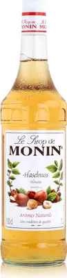A bottle of Monin Hazelnut syrup.