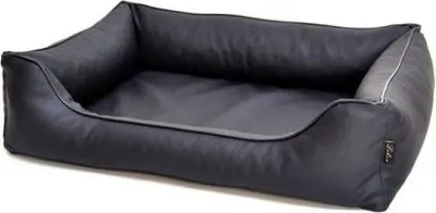 A black dog bed is shown against a white background.