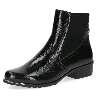 A studio shot of a single black ankle boot against a white background.