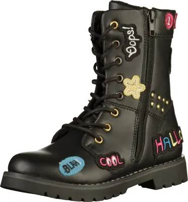 A black boot with various patches and embellishments.