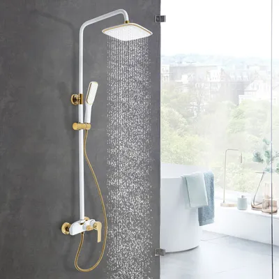 A modern bathroom with a shower system in use, overlooking a scenic view.