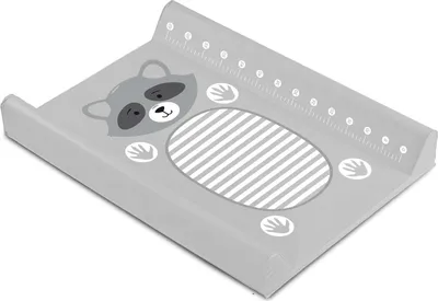 A changing mat with a raccoon design and a ruler.