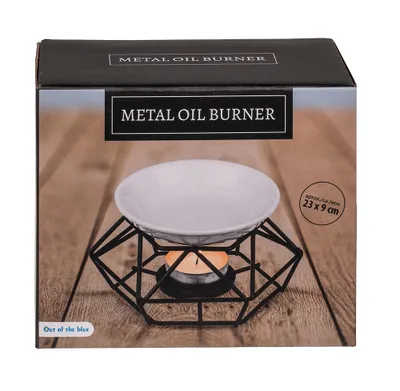 The image shows the packaging of a metal oil burner, with a picture of the product on the front.