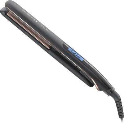 A close-up, angled view of a dark gray hair straightener with rose gold accents, set against a white background.