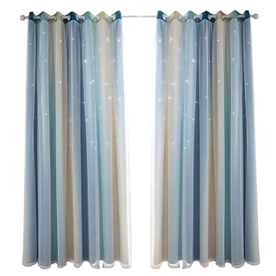Two sheer curtains with a gradient color pattern and small sparkling stars hanging on a curtain rod.
