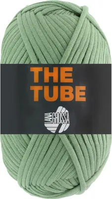 A ball of green yarn with a black label.