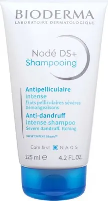 A white tube of Bioderma Nodé DS+ Shampoo with a blue cap.
