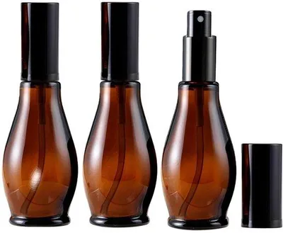 Produktbild von Sprayflaschen - 3er Set - Herstellbare Glaskolben - Bernsteinfarbe - Für Kosmetik und Reinigung - 100 ml - Feine Sprühnebelversteller