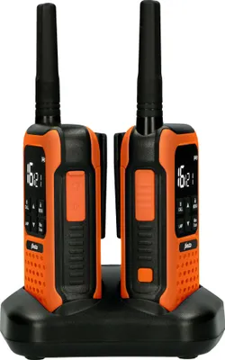 Two orange and black walkie-talkies are placed in a black charging dock.