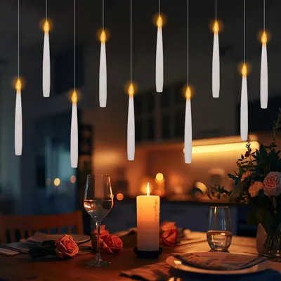 Produktbild von Eikuavons LED Schwebende Kerzen 12er Set mit Zauberstab, Timer, Warmweiß