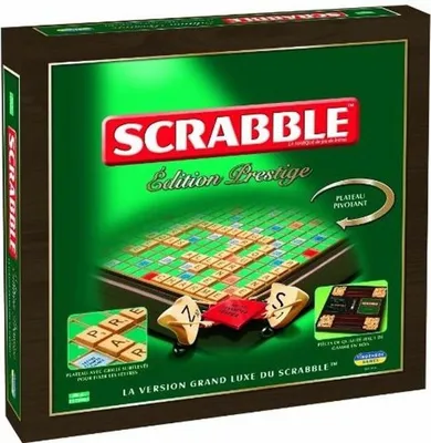 The image shows the front of a Scrabble Prestige Edition game box, with a depiction of the game board and pieces on the front.