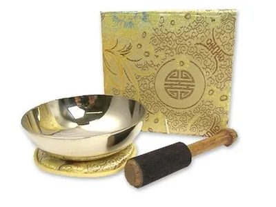 Produktbild von Flache Klangschale in Box mit cremefarbigem Stoffbezug