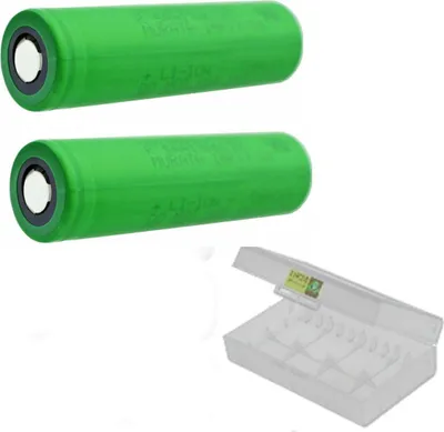 Two green batteries and a clear plastic battery case are shown against a white background.