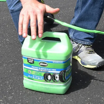 Image de Slime 3,8 l - Produit d'étanchéité pour pneus sans chambre à air - Vert  Vert - Taille unique