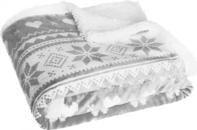A folded blanket with a Christmas pattern.