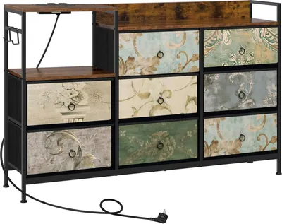 A dresser with 8 drawers, each featuring a different vintage floral pattern, set against a white background. The dresser has a metal frame and wooden top, with integrated power outlets on the top shelf.